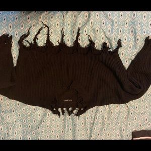 Cropped black sweater top.